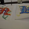 inicjay uczniww malowane na pergaminie artystycznym